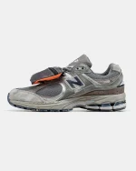 New Balance 2002R Grey Brown Pouch